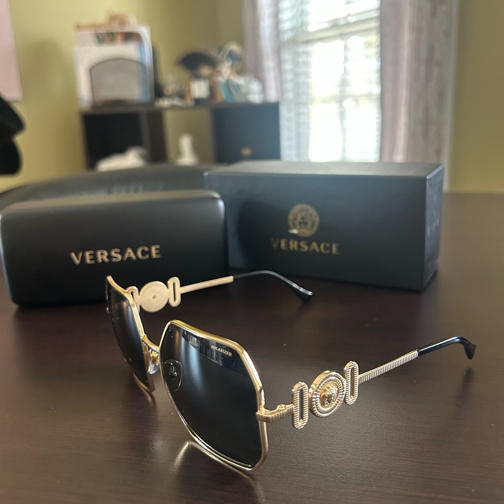 Versace Women's Sunglasses with Gold Frame and Black Lenses